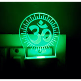 MultiColor acrylic and plastic Om Mantra AC Adapter Night Lamp. Laser-engraved 3D illusion design for living room, bedroom, or gifting. Safe, low energy consumption, no chemical odors